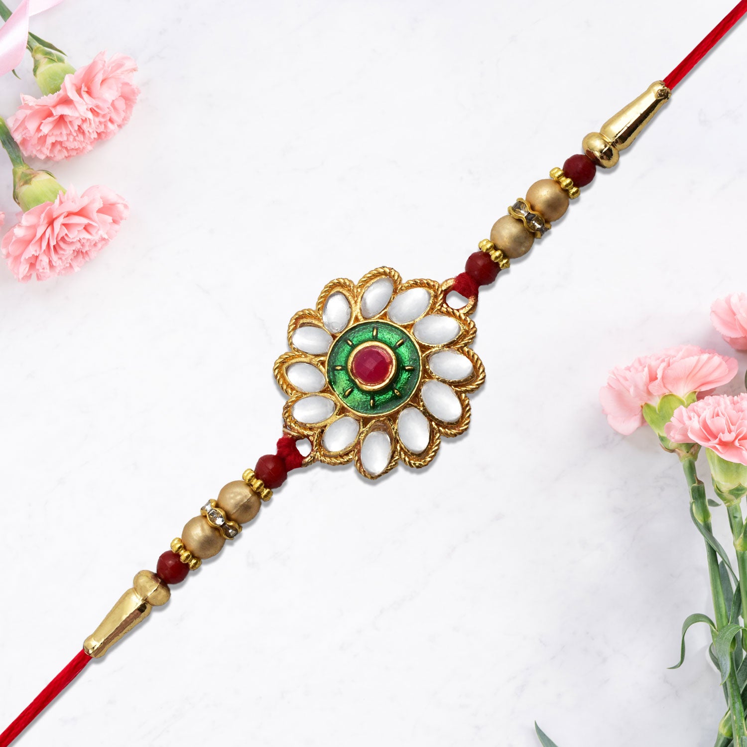 Kundan Floral Rakhi With Green  Red Centerpiece Kundan Floral Rakhi With Green  Red Centerpiece